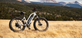 Himiway D3 Cruiser Step-Thru in Weiß – E-Fatbike mit breiten Reifen und integriertem Akku, bereit für Abenteuer zwischen goldenen Wiesen und verschneiten Bergen
